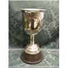Image 1 : An Indian white metal racing trophy, of bucket shape, the body chased  wtih bands of flowers and