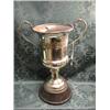 Image 1 : An Indian white metal 2-handled racing trophy, of campana shape,  chased with a band of flowers a