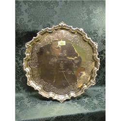 A George VI silver tray, having a shaped edge cast with shell,  foliate and egg and dart ornament