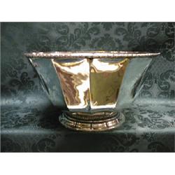 An Indian silver panelled circular bowl, with egg and dart rim,  seated on a collar of overlappin