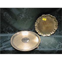 An EPNS circular tray, with bead border and machine turned with  vacant medallion to the centre,