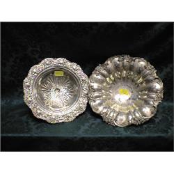 An EPNS fruit basket, of lobed circular shape, the border cast with  flowers, folige and scrolls,