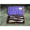 Image 1 : An Edward VII silver dressing set, cased, comprising glove stretchers, shoe horn, button hook and