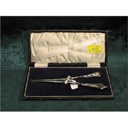 A pair of silver handles glove stretcher, Birmingham 1925, cased.