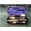 Image 1 : A Victorian child's silver knife, fork and spoon presentation set,  the twist, guilloche handles