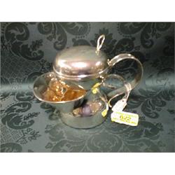 A Victorian silver shaving mug, with scroll handle, the domed, hinged  cover with open thumbpiece