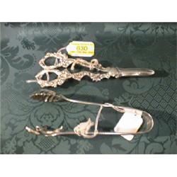 A pair of EPNS grape scissors, the handles cast with fruiting vine,  together with a pair of EPNS