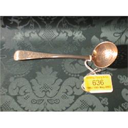 A George III silver sugar spoon, probably by William Eley, with  pierced bowl and foliate engrave