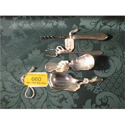 Two silver caddy spoons, 1904 and 1948, a silver handled corkscrew,  1916 and a small pickle fork