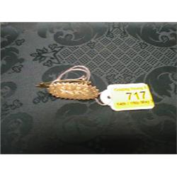 An Edwardian 9ct rose gold brooch with yellow gold foliate decoration  and a rose gold bar brooch