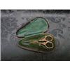 Image 1 : A pair of cased ornately decorated needlework scissors.