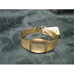 A 9ct gold gentleman's Omega de Ville wristwatch on a mesh bracelet,  champagne dial with baton n