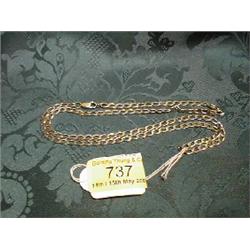 A long curb link chain in yellow metal stamped for 9ct