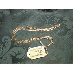 A fancy link chain in yellow metal, stamped for 9ct. 19 ins long