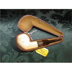 An amber and meerschaum pipe with engraved silver ferrule, early  20thC., in fitted case.