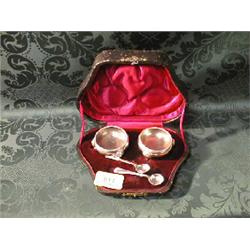 A cased pair of Hukin and Heath silver cauldron salts and two bead  pattern spoons Birmingham ass