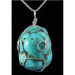 NATURAL 255.33CTW TURQUOISE WIRE WRAPPED PENDANT