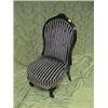 Image 1 : A Victorian rosewood and walnut framed spoonback nursing chair with  floral carved cresting rail,