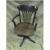 Image 1 : An Edwardian oak swivel office chair.