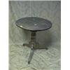 Image 1 : A Victorian oak and satinwood tripod table.