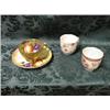 Image 1 : A Royal Worcester teacup and saucer, harvest fruit and gilt  decoration (AF), and 2 other cups.