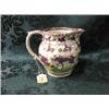 Image 1 : An early 19thC. Sunderland lustre jug, moulded with bacchanalian decoration around hounds in relie