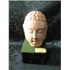 Image 1 : A carved stone Buddhist head, 5" high, and wooden plinth.