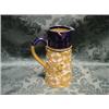 Image 1 : A Royal Doulton Slaters Patent jug, the buff lace body enamelled and  highlighted in turquoise, wh