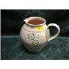 Image 1 : A Poole pottery jug, tulip and daisy decoration No 303 impressed.