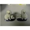Image 1 : A pair of Staffordshire pottery animal groups, modelled as poodles  and 2 puppies, on rich blue ba