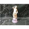 Image 1 : A Wedgwood figure of Terpsichore, white glazed, on blue jasper  circular base, with foliate border