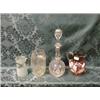 Image 1 : A panel cut sherry decanter with moulded stopper, glass vase with  reptile skin moulding, a froste