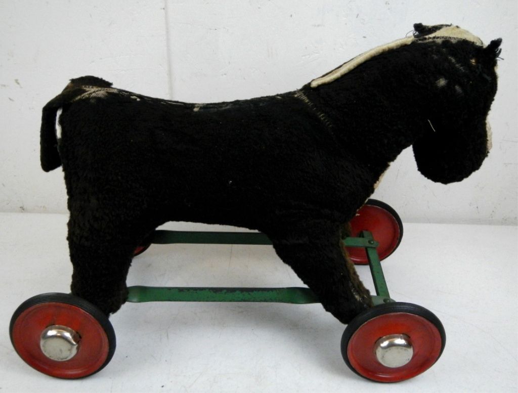 vintage riding horse toy with wheels