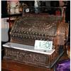 Image 1 : A bygone National brass cash register