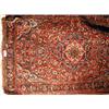 Image 1 : A hand knotted Persian woollen rug with elaborate allover foliate decoration
