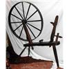 Image 1 : A large wooden spinning wheel