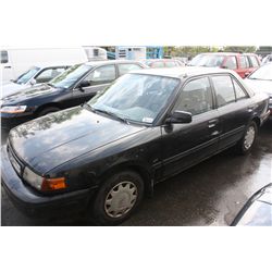 1990 BLACK MAZDA PROTEGE LX 4DR, SDN,  336720 KM, GAS, 1.8L MANUAL, VIN:JM1BG2230L0180947. TTL9