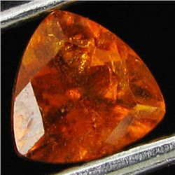 0.6ct Mandarin Fire Orange Clinohumite Trillion (GEM-044037)