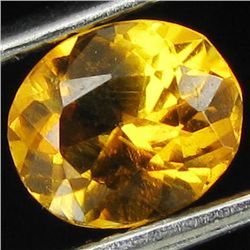 0.95ct Mandarin Orange Clinohumite Tajikistan  Oval (GEM-042750)