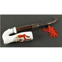 White Porcelain Pipe Shows Knights Helmet