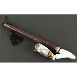 White Porcelain Pipe Shows Gentleman Watering