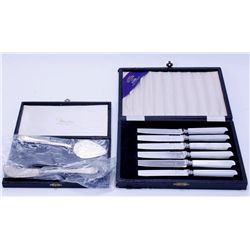 6 Knives and 2 Serving Utinsels