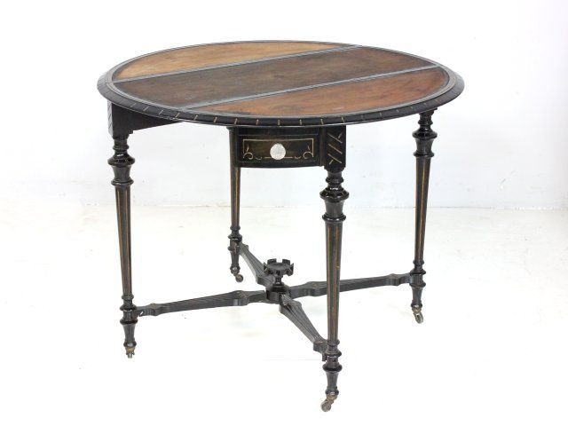 A Cutler Son New York Swing Leg Table