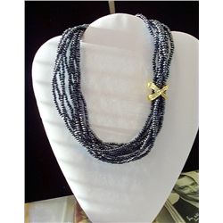 DESIGNER NOLAN MILLER GREY TORSADE NECKLACE