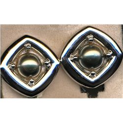 CHRISTIAN DIOR RHODIUM CLIP EARRINGS, signed