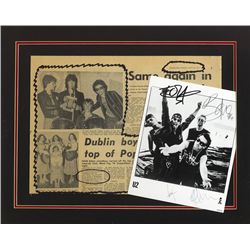 U2: First press mention newspaper and signed photograph