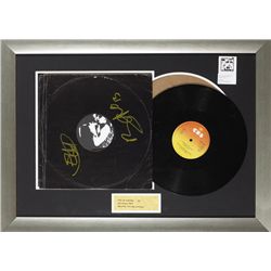 U2: 'Out Of Control' 12 vinyl record signed on the sleeve by Bono and The Edge"