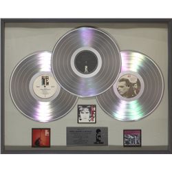 U2: Island Records presentation 'platinum' discs for the albums 'The Unforgettable Fire', 'Under a B