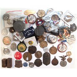 Starter bag of pins, medals, badges, etc.