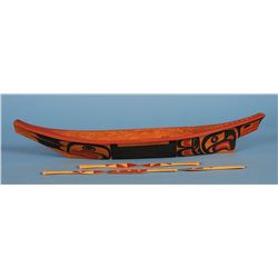 Kwaguilth Model Canoe with Painted Design, Four Paddles and a Steering Paddle Carved by Steven Hunt